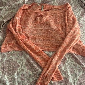 Pink sweater with open back